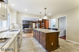 view of the kitchen opens into the family room