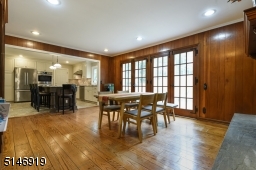 WOW! fabulous space features the  kitchen / breakfast area/ family room, wood floor