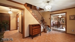 Spacious Entry offers room to welcome guests. Entry leads to Dining Room on the right and to the Living Room on the Left.