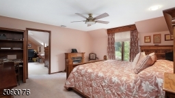 Large Master Bedroom with adjoining Dressing/Sitting Area, Walk in Closet and a Large Master Bath Area.