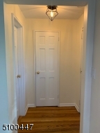 FOYER WITH GUEST CLOSET AND POWDER ROOM