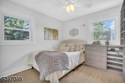 Beautiful built in shelving and dresser, lots of natural light, ceiling fan