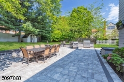 This patio is even more gorgeous in person. There are 3 entertaining areas w/ room for all