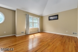 With Vaulted ceiling, Walk-in Closet, and Full Bath.