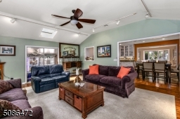 Family Room/Great Room with cathedral ceiling and skylight