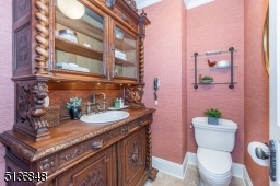 A powder room with an antique sink