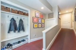 A mudroom area with ramp access to the garage complete the living spaces.