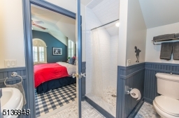 Secondary bedrooms on this level include another suite with a semi-private bath, two bedrooms that share a Jack-and-Jill bath and a fifth bedroom.