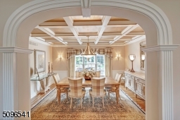 I just love this room! it is oversized, sunny and has an amazing coffered ceiling.