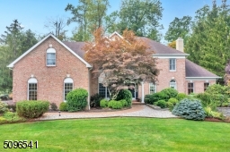 Stately brick front home located in the upscale neighborhood of "Warren Chase"