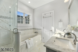 Jacuzzi Tub, large custom shower,, and double vanity gives you a feeling of living in your own oasis