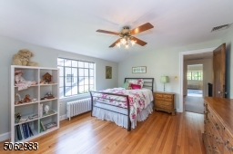 Bursting with sunshine, the three spacious upstairs bedrooms include and inviting master bedroom suite with en-suite bath and two large closets, a second bedroom with a walk-in closet, and a third bedroom with a large cedar closet.