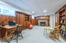 Playroom, office and/or exercise area? That's for you to decide for this functional Lower Level with a decorative fireplace and loads of storage.