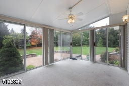 Sunroom addition with glass sliders leading to backyard, bring the outdoors in.