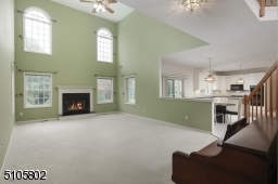 Spacious family room with cathedral ceiling and cozy fireplace make this a truly great greatroom!