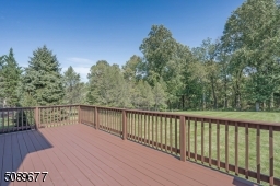 Enjoy entertaining on your large deck while looking at the tranquil backyard. The entire backyard is fenced-in and private.