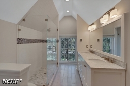 You'll enjoy the oversized shower, beautiful ceiling detail and two linen closets