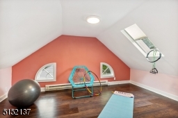 Third floor playroom, exercise room or office with skylight with new pleated shade