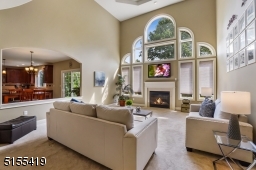 With a gas fireplace and high ceilings