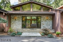 Stunning stone entrance grace this beautiful home.