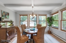 Windows everywhere provide light and air-the perfect spot for casual dining overlooking the glorious backyard.