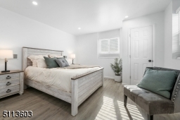 Fourth bedroom, or in-law suite, sits on the ground level and is bright with a roomy closet.