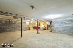 Unfinished basement with laundry hook up