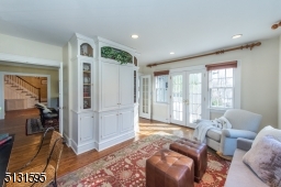 . Two sets of French doors open to a family room and onto the fenced backyard and patio, creating an outstanding indoor-outdoor flow.