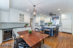 Chefs will love the dream kitchen and breakfast room featuring bright windows, custom cabinetry, a large center island and high-end Viking and Sub-Zero stainless steel appliances.