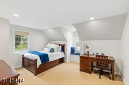Bedroom 3 with wall-to-wall carpeting, recessed lights, two exposures of windows and a double fitted closet