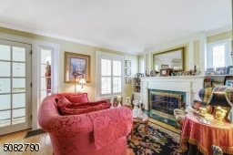 with a cozy sitting area by the gas fireplace