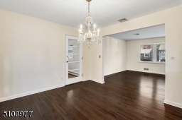 Leads to Living Room and Home Office. Gorgeous hardwood flooring just refinished and a freshly painted interior.