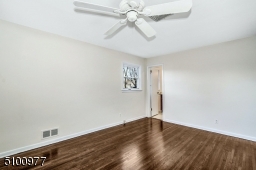 Gorgeous hardwood flooring just refinished and a freshly painted interior.