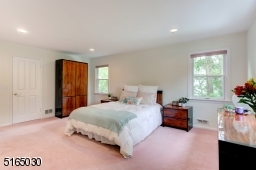 Two walk-in Closets and full bath with stall shower.
