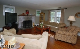 Hardwood Floors and Wood Burning Fireplace