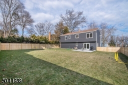 Completely fenced-in, you can play worry free in this spacious backyard that offers plenty of room for adding playground equipment, playing badminton and more.
