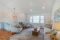 Bright and airy yet intimate, the living room is part of an open concept design, and blends effortlessly into the dining room creating a great space for entertaining.