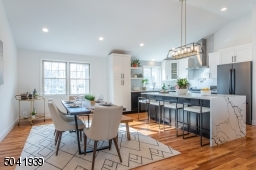 Perfectly situated, the dining room adjoins the kitchen and living room making parties and dinners a snap.