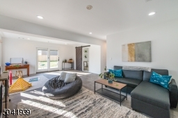 Casual meets modern comfort in this spacious family room that boasts a fabulous spa bath, laundry room and sliding glass doors that lead to an outdoor patio and a sprawling yard.