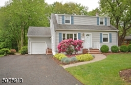 Mature Plantings in this well-maintained Cape Cod 3 bedroom home