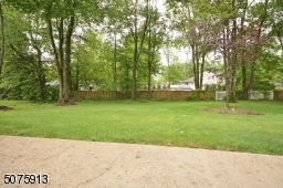 Nice size backyard with some fencing and spacious patio