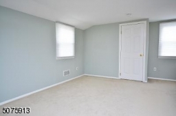 Another view of this spacious bedroom - might even be a nice sitting area