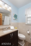 Renovated 3 yrs ago with stone sink, porcelain tiles
