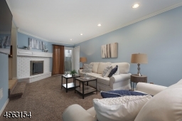 Wall-to-wall carpeting, Anderson slider to the rear yard with beautiful landscaped yard