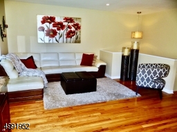 Amazing Living Room with Beautiful Hardwood floors throughout home