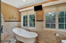 The master bath as observed from the opposing perspective.