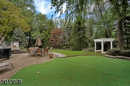 Here we see a shot of the lush and level rear grounds.