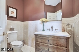 The powder is situated discreetly off the foyer.