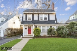 Covered Front Entry leads to solid wood front door.