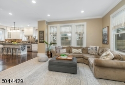 Family Room Opens To Kitchen